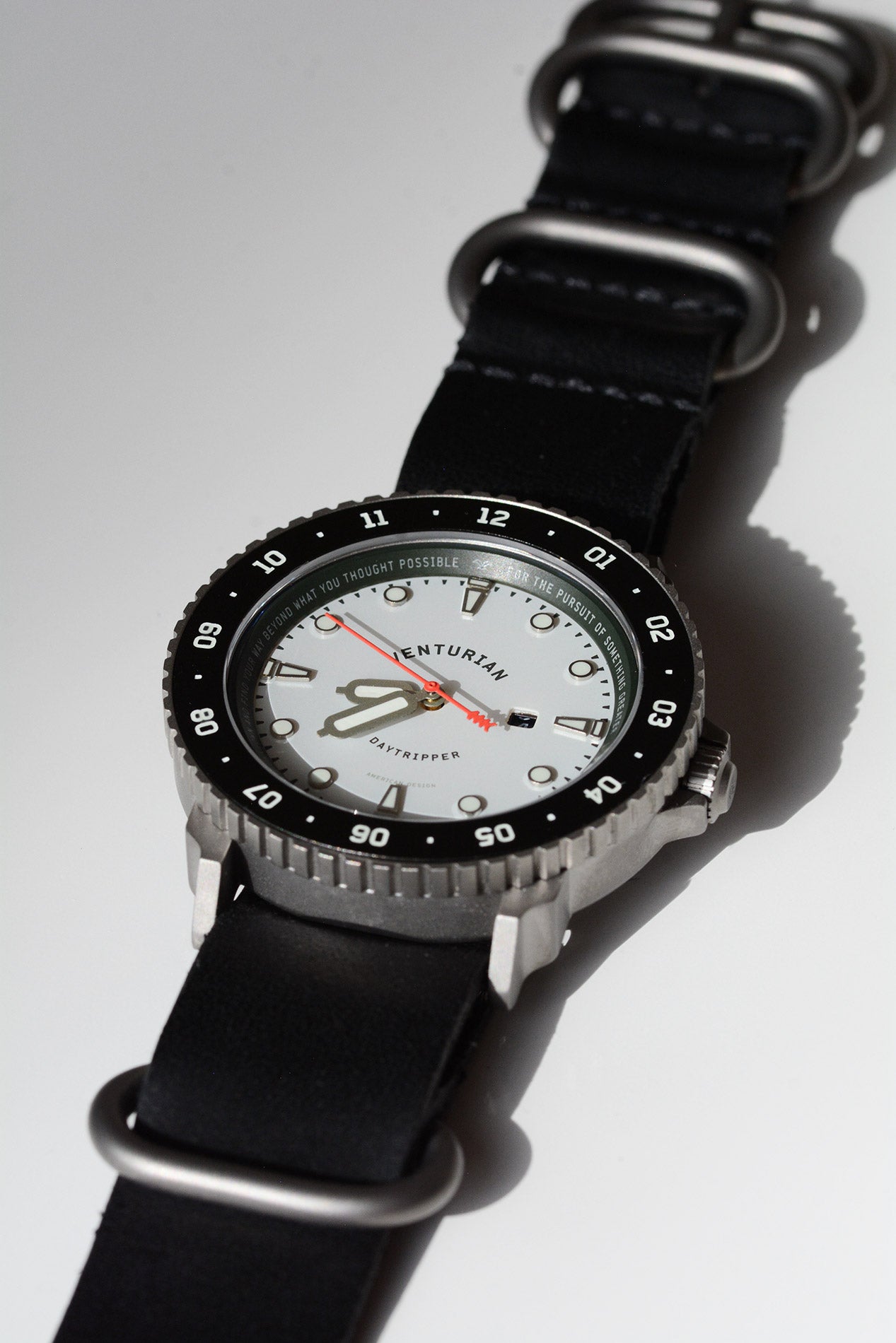 Venturian WatchWorks Daytripper mens watch — 38mm dual timer bezel. case plus strap on white.