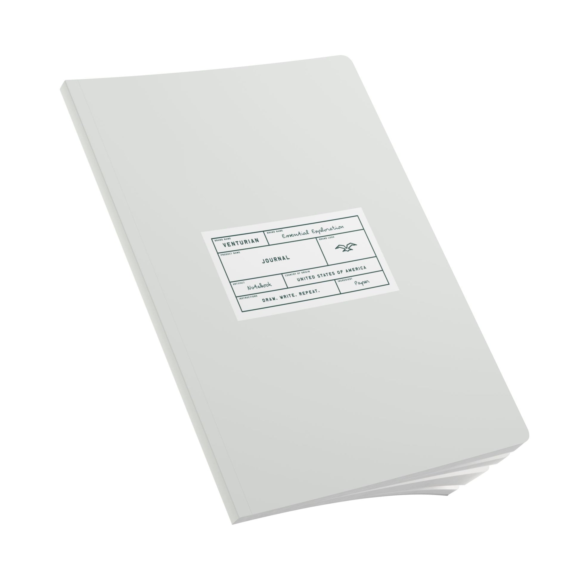 White notebook with a label on a white background