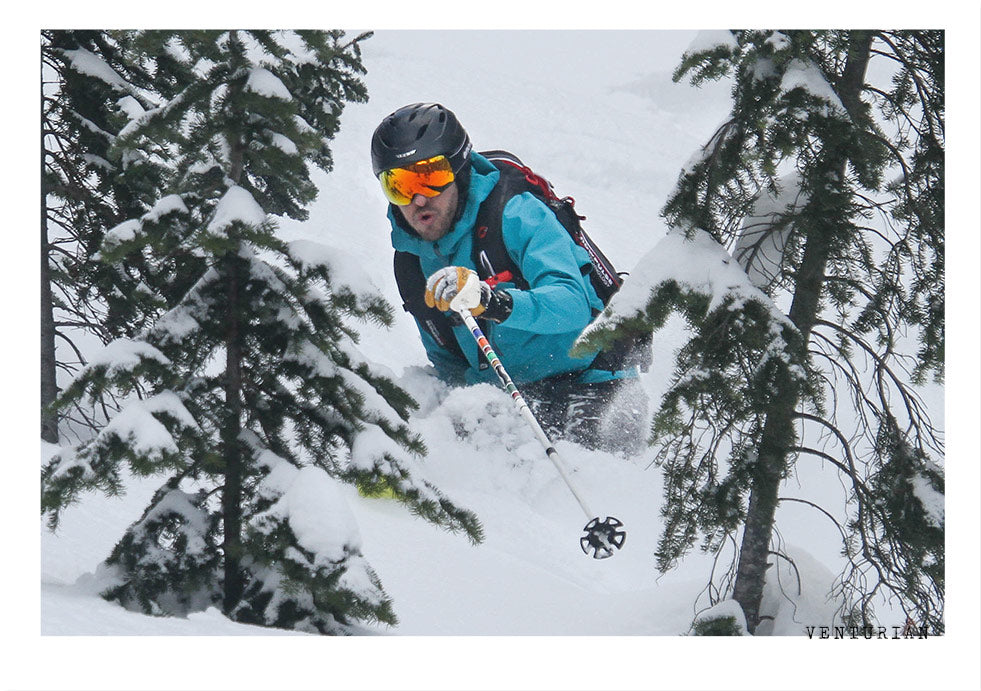 Venturian Watch Works founder Jason Strong skis in powder in the British Columbian back country with Valkyr Adventures