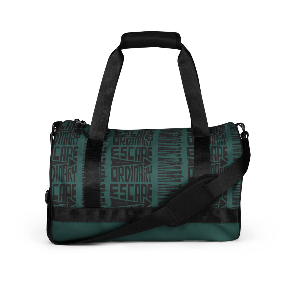 Green duffel bag with black straps on a white background