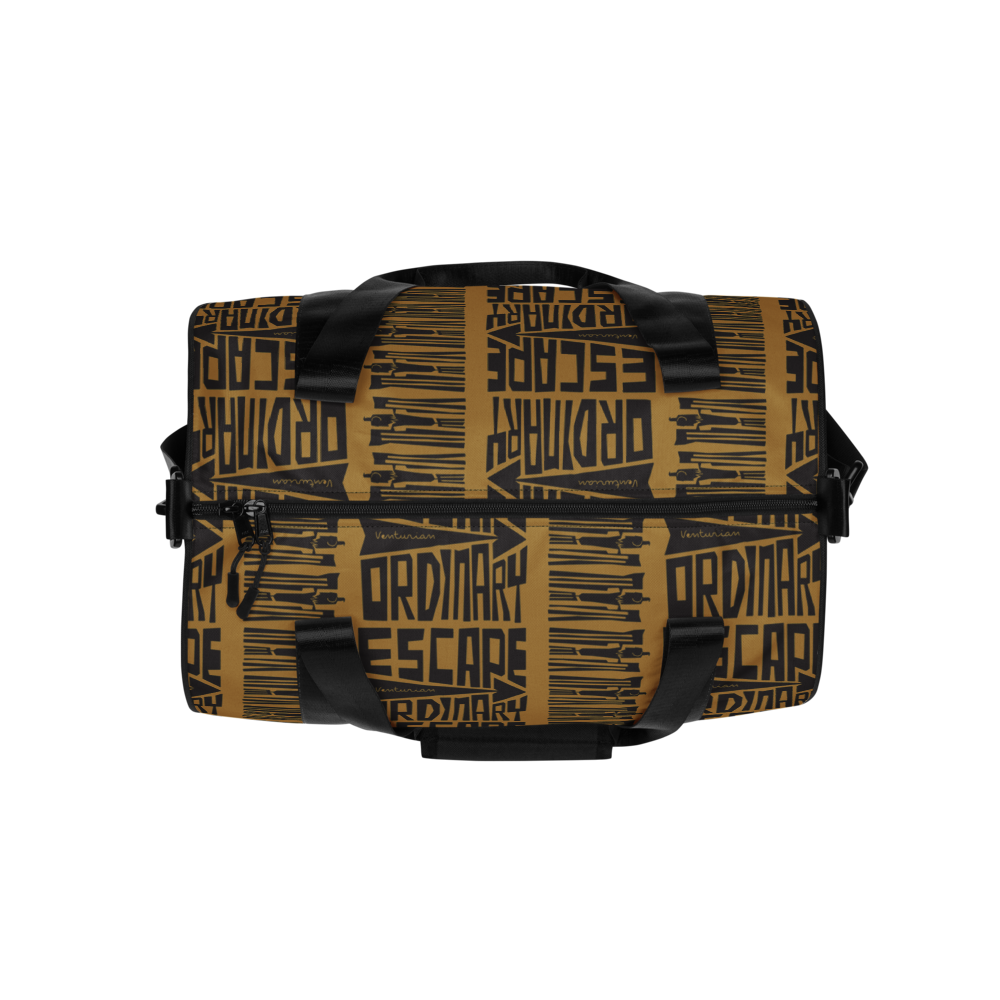 Black and gold bag with 'Ordinary Escape' pattern on a white background