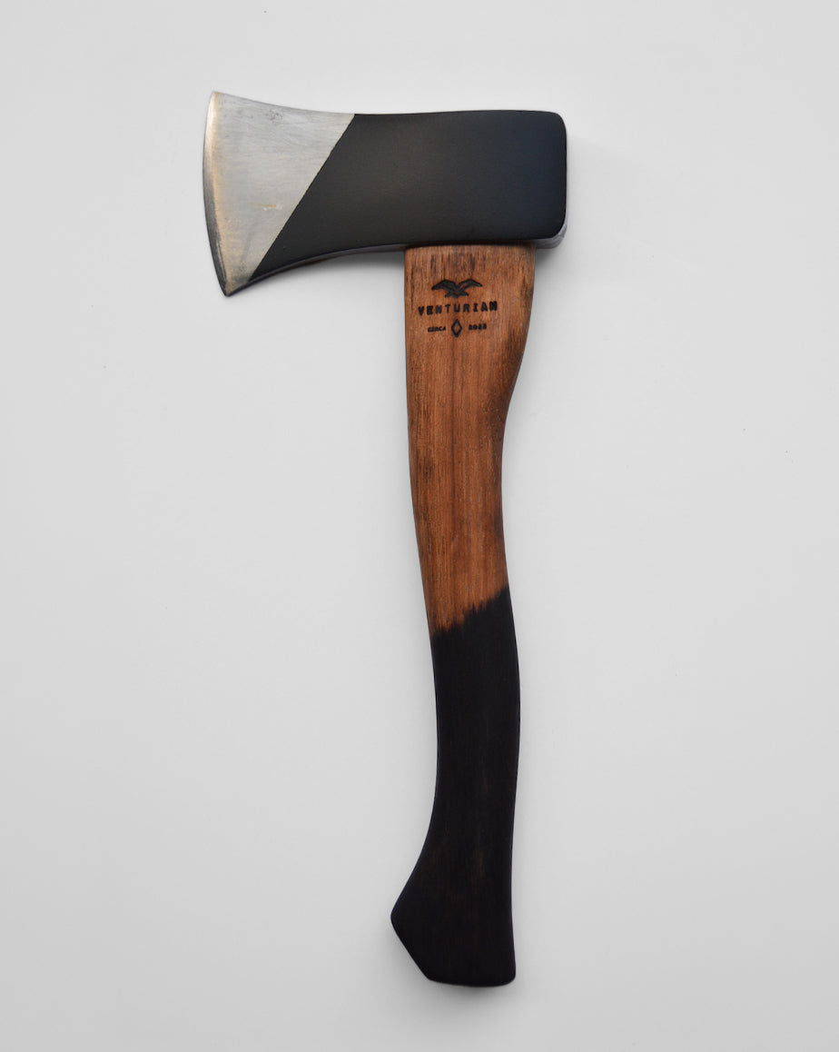 a camp axe or hatchet with a blacked head and handle