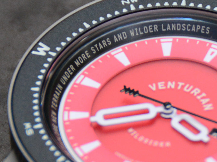 A close up of the Wildsider watch's inspiring mantras that reads, “Take time to explore new terrain under more stars and wilder landscapes”