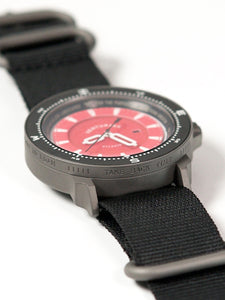 The Venturian Wildsider 38MM Solar Titanium compass tool watch in Red south mantra