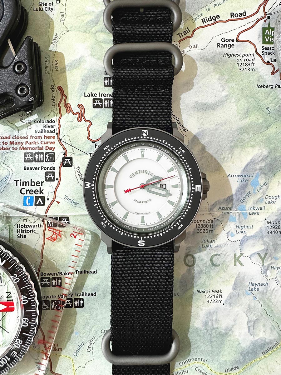 The Venturian Wildsider 38MM Solar Titanium compass tool watch in White on map