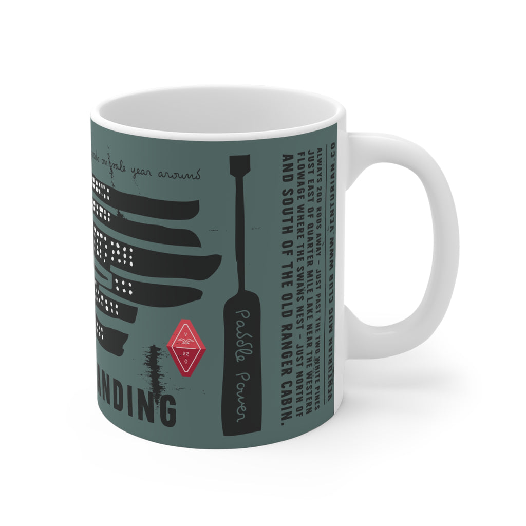 Mug with graphic design and text on a white background