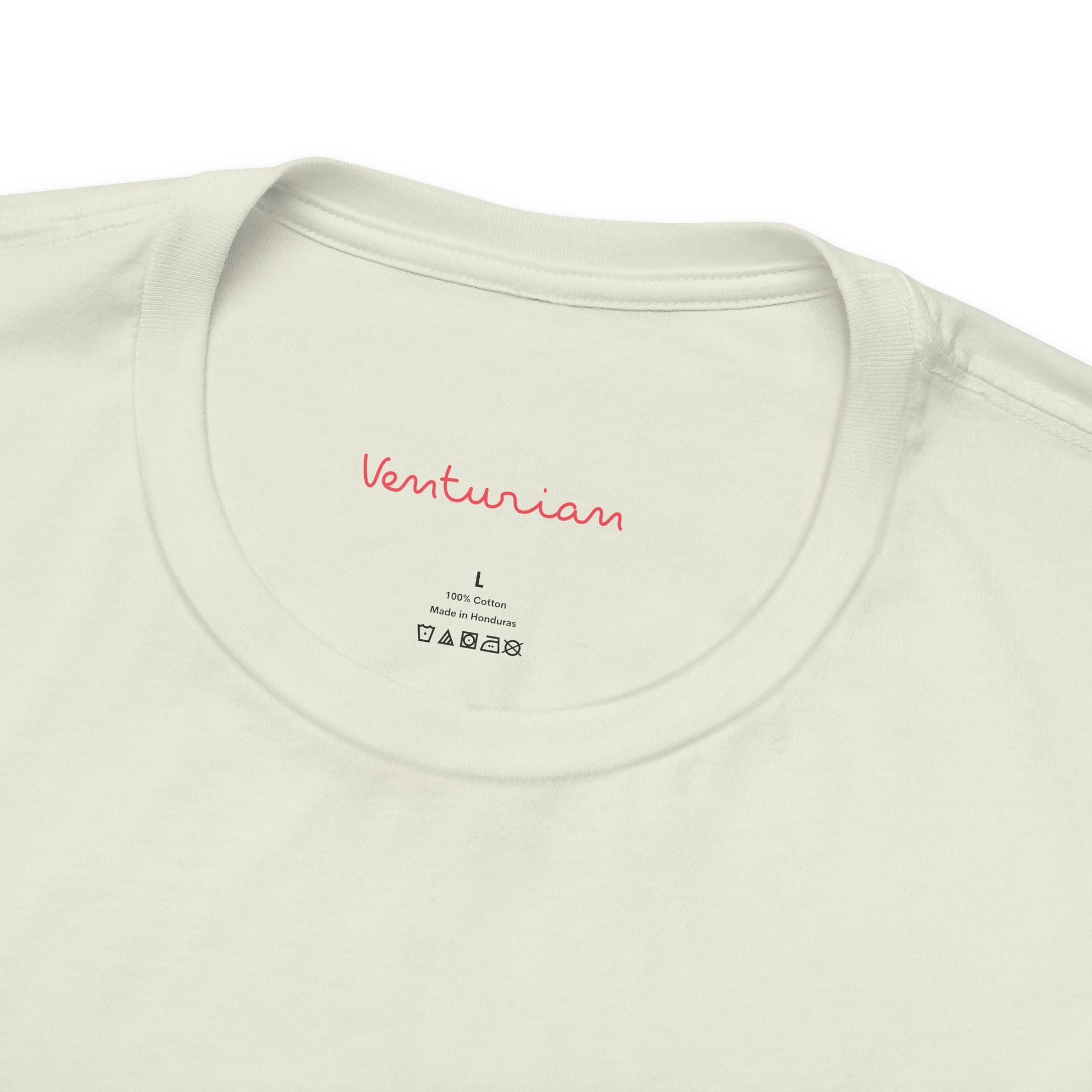 Close-up of a citron t-shirt with 'Venturian' branding on a white background