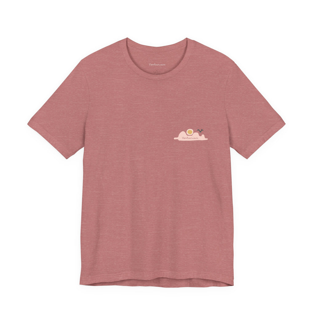 Pink t-shirt with a small graphic on a white background