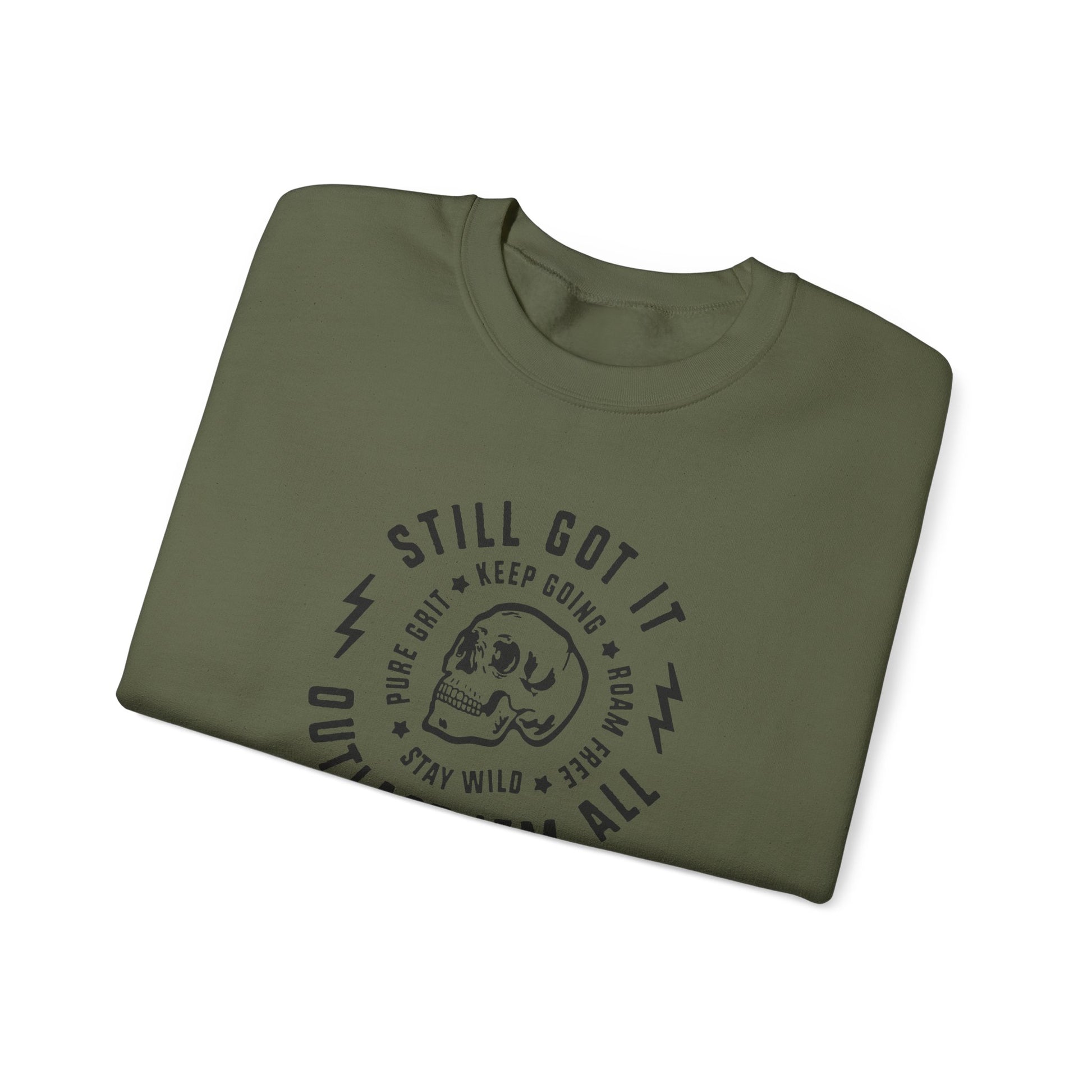 Folded green t-shirt with black text and graphics on a white background